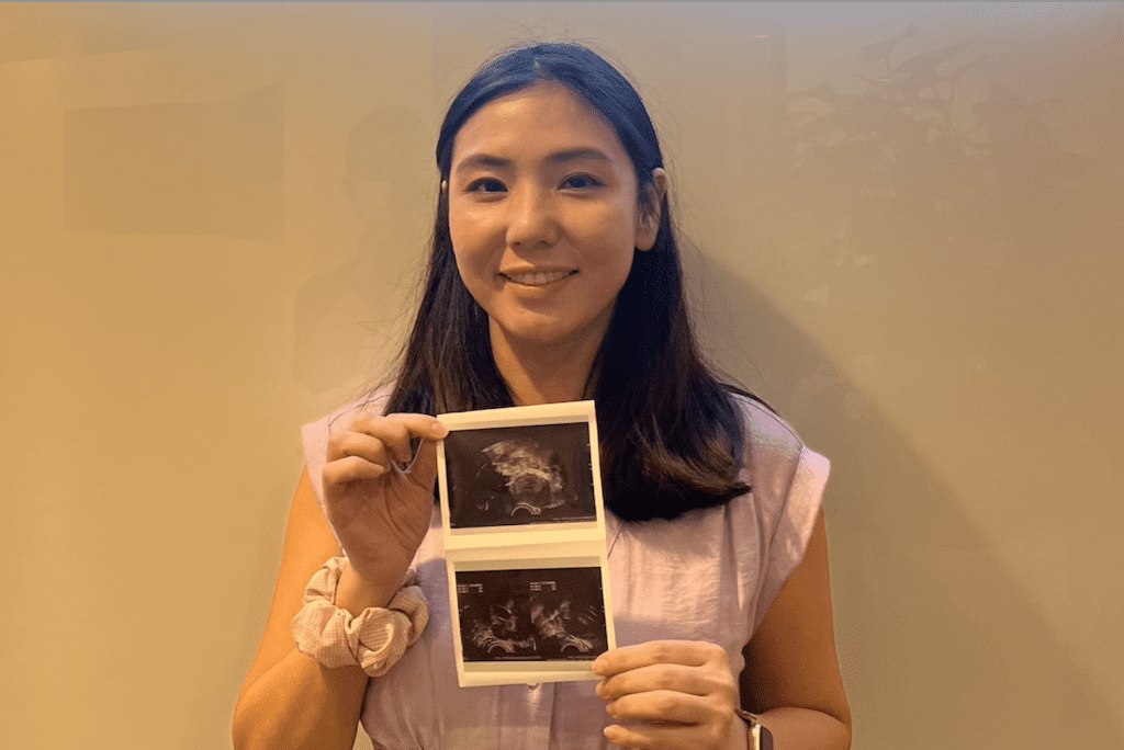 Beverly showing her ultrasound result.