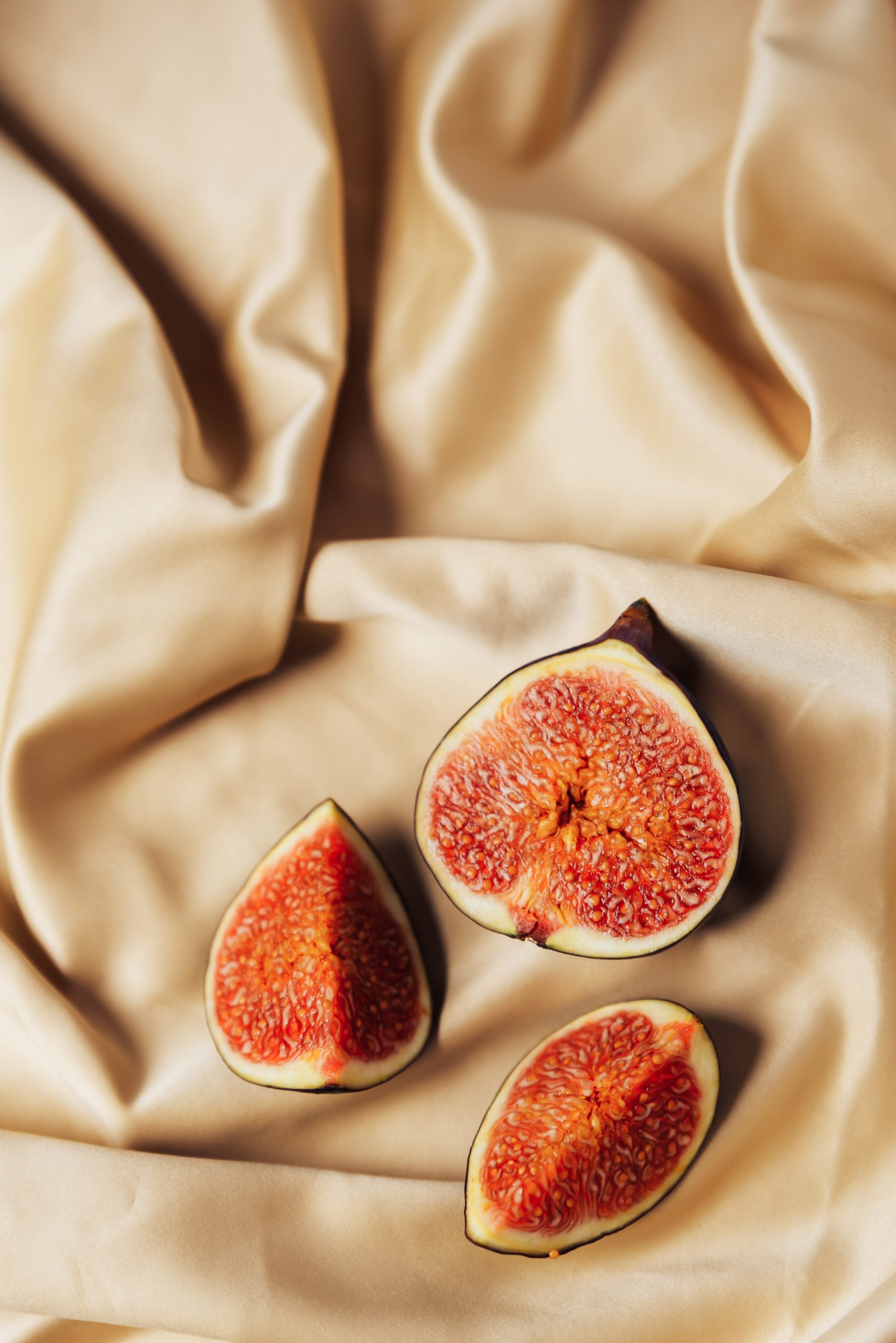 Fig in a cut on a satin fabric